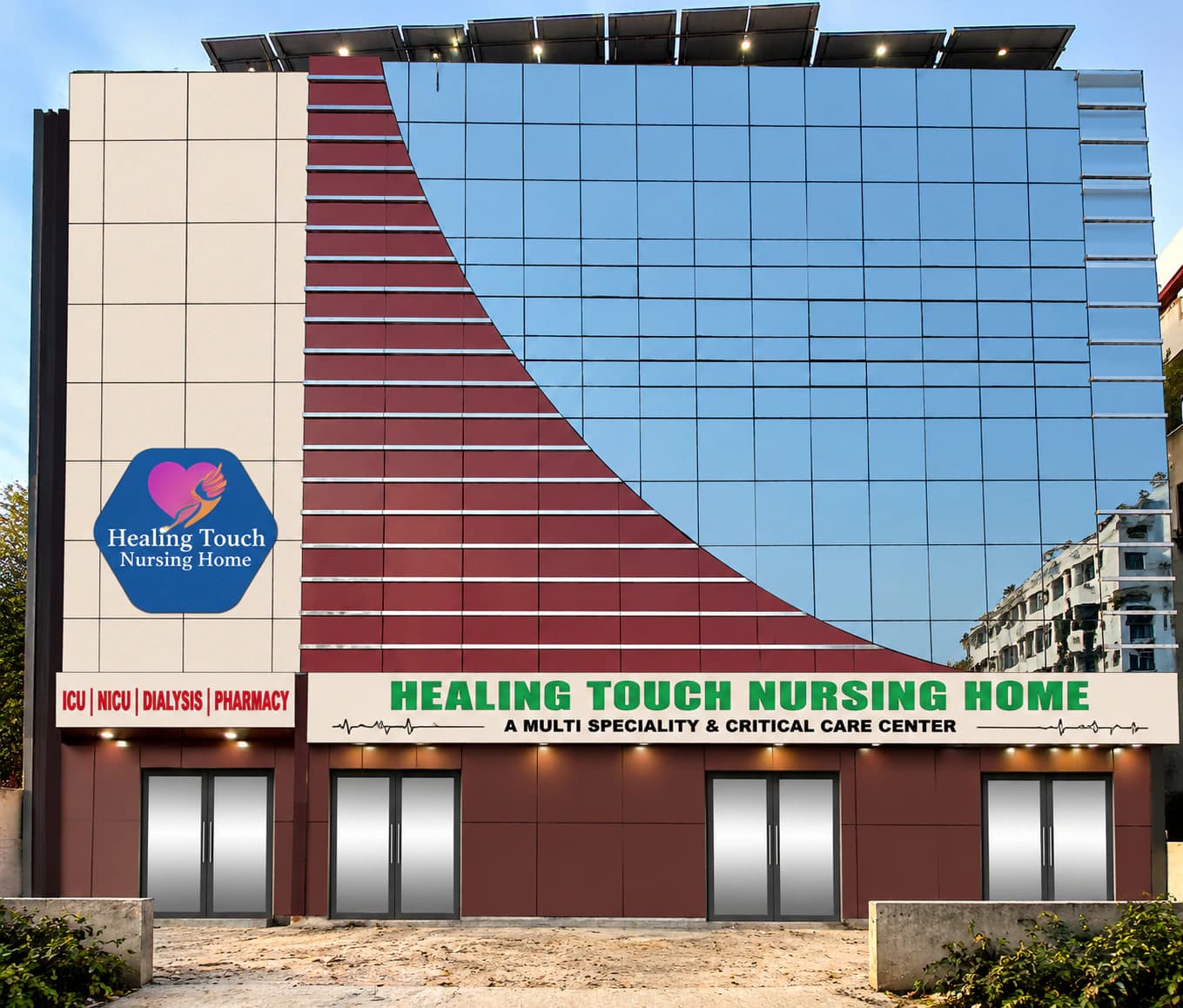 Building signage on the facade of Healing Touch Nursing Home, a multi-speciality and critical care centre